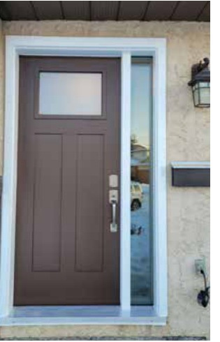 Smooth fiberglass craftsman entry door with sidelite