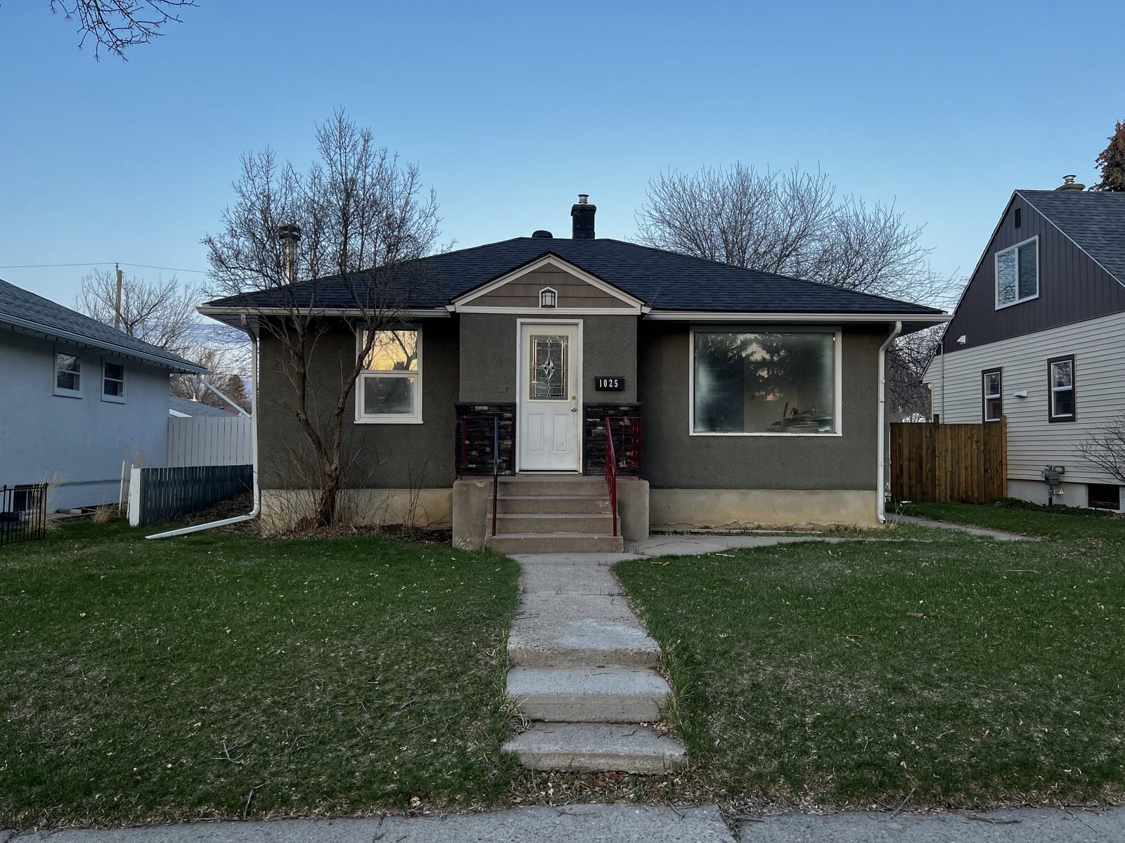 Before — original windows on Lethbridge home