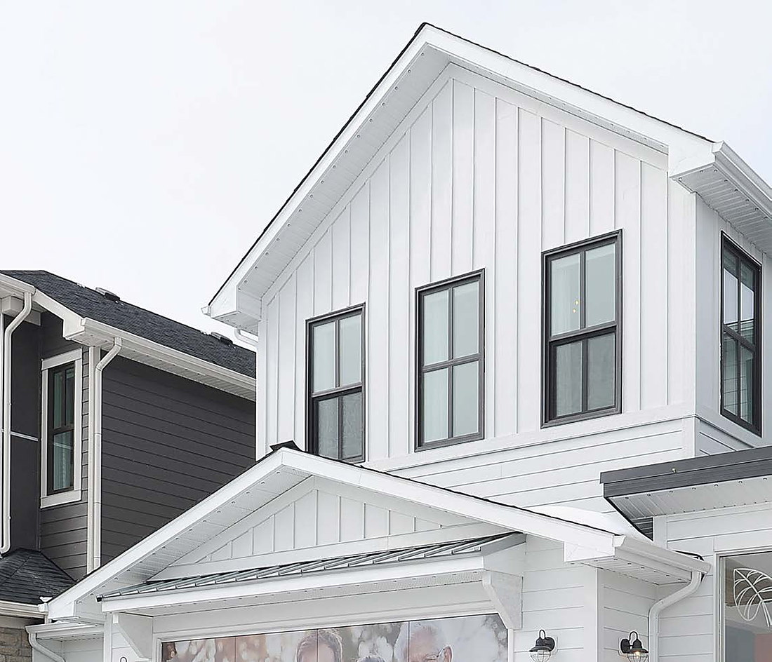Modern farmhouse exterior with black-framed windows