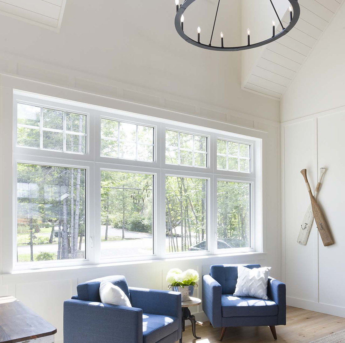 Bright living room with a full wall of new windows