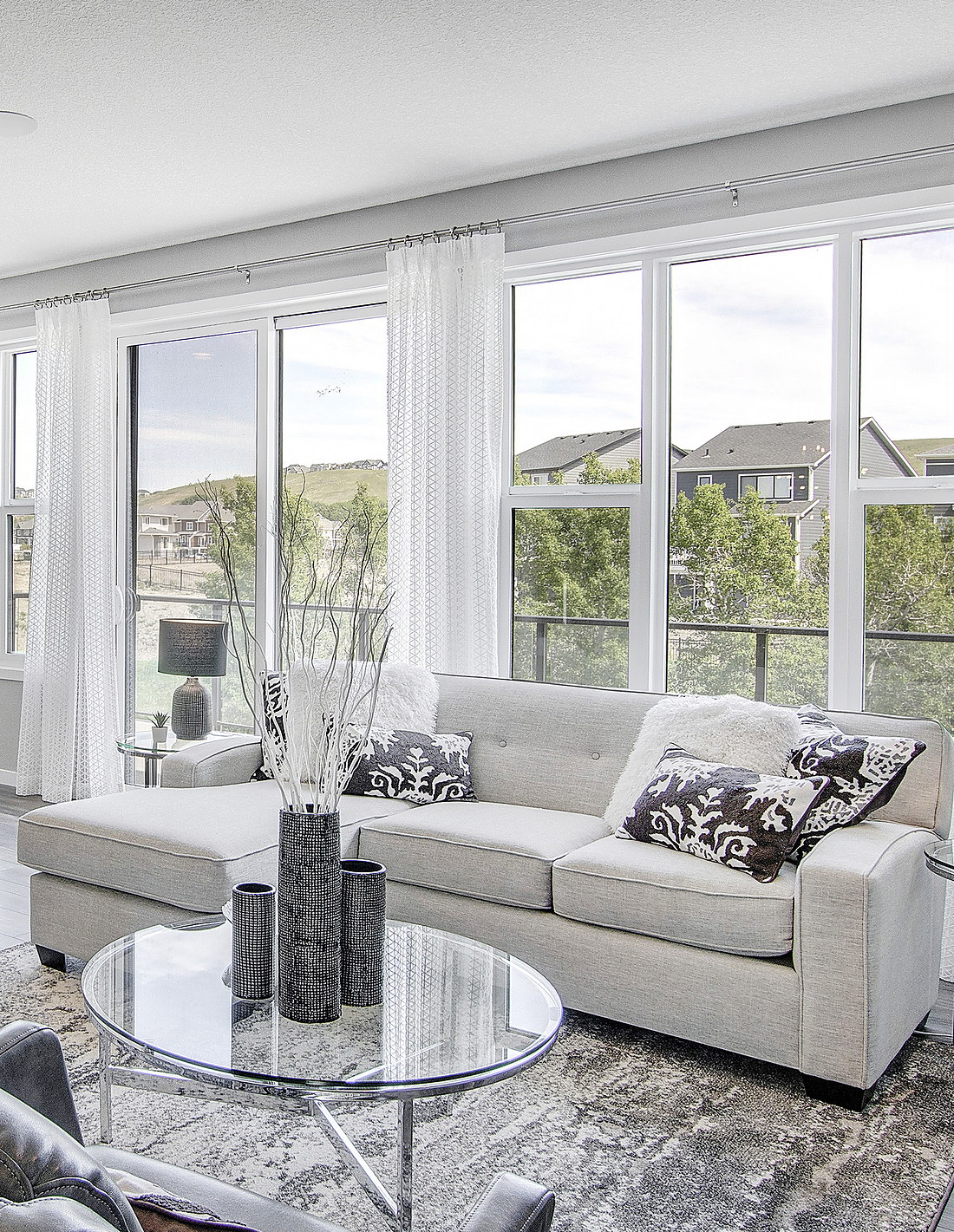 Living room with a full wall of windows